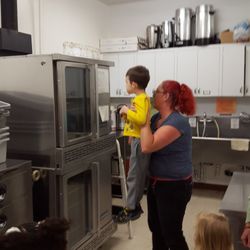 Mother's Morning Out - Checking out what is cooking in the oven.....