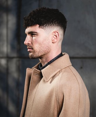 Mens Haircut Services - We set out in 2014 to change the way people think of a classic barbershop. We signed an ambitious lease in the heart of Cushing Sq. and we haven’t looked back since. We may have started in Melrose and been existing members of a thriving community, but Belmont showed us that you can have two families. Cushing Square has changed drastically over the years but the foundation of how we started has not. We are lucky to call Belmont our home away from home. Trust us, you’ll feel the same. Barbers Den Belmont is meticulously designed with restored embroidered vintage chairs and a classic aesthetic where the modern gentleman can enjoy a truly indulgent grooming experience at a great value.  Our barbers in Belmont are focused on creating an experience that earns your loyalty - we value and respect the time you spend with us. Each expert barber offers their expert knowledge of hair with approachable advice with the sharpest skills for you to look your best. 

Use our easy online system to make an appointment today with the BOOK NOW button! https://barbersden.com/belmont