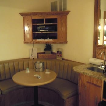Sybaris Pool Suites - Sitting area in bedroom of swimming pool suite. - Hotels Near Me - Downers Grove, Illinois Sybaris Pool Suites - Sitting area in bedroom of swimming pool suite. - Hotels Near Me - Downers Grove, Illinois