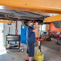 M&M Workshop - Jacob working on a BMW 530I.
