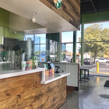 Tastea - Order Area w/ sneeze guards & sticker on grounds to promote social distancing - Coffee & Tea Near Me - Anaheim, California Tastea - Order Area w/ sneeze guards & sticker on grounds to promote social distancing - Coffee & Tea Near Me - Anaheim, California