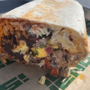 Los Buenos Tacos - Breakfast burrito with chorizo. Pretty good but was kind missing some flavor. Added hot sauce to help - Tacos Near Me - Miami, Florida
