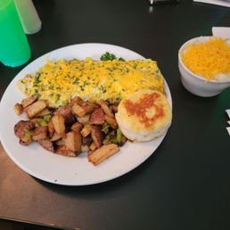 veggie omelet, potatoes, biscuit and cheese grits