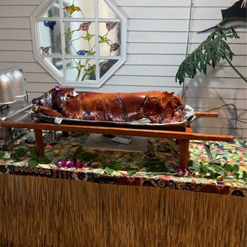 Islanders Luau - Pig ceremony - Caterers Near Me - Riverside, California