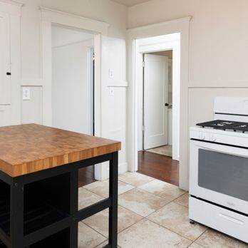 Adam Kelley - Functional kitchen with gas stove and butcher block island by Adam Kelley Real Estate, Carlsbad CA. - Real Estate Agents Near Me - Carlsbad, California