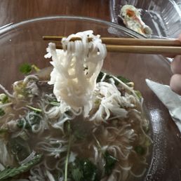 Noodles sticking together in barely warm broth