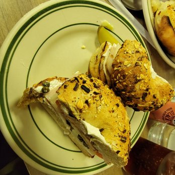 Barney Greengrass - Sturgeon + cream cheese + tomato+ capers on a whole wheat everything bagel - Specialty Food Near Me - New York, New York Barney Greengrass - Sturgeon + cream cheese + tomato+ capers on a whole wheat everything bagel - Specialty Food Near Me - New York, New York