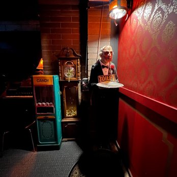 Suna Studios - a woman sitting at a table in a dimly lit room - Music Venues Near Me - Vancouver, British Columbia Suna Studios - a woman sitting at a table in a dimly lit room - Music Venues Near Me - Vancouver, British Columbia