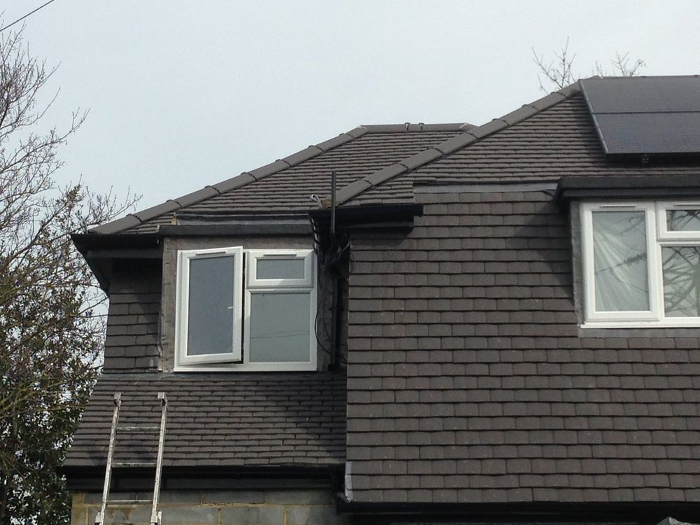 Slide of Pecan Park Roofing