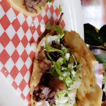Mango's Restaurant - Gordita on the right and half a taco i took a bite cause it looked damn good. - Mexican Near Me - Saint Paul, Minnesota Mango's Restaurant - Gordita on the right and half a taco i took a bite cause it looked damn good. - Mexican Near Me - Saint Paul, Minnesota