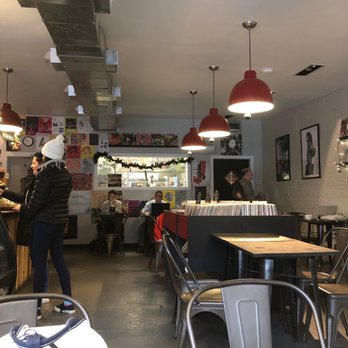 Baby's On Fire - Simple seating area, love the records. - Coffee & Tea Near Me - Baltimore, Maryland