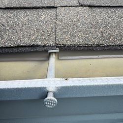 Fossil Ridge Roofing and Construction - Hangars not installed properly, sheet metal was snipped and rolled back instead of the proper fastening.