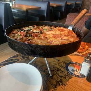 BJ's Restaurant & Brewhouse - Large deep dish half veggie half pepperoni - New American Near Me - Cary, North Carolina