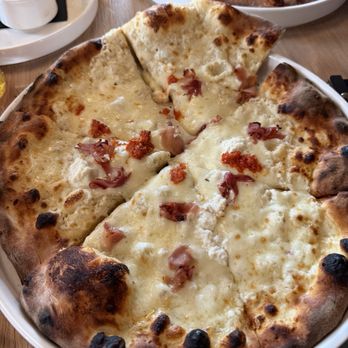 Black Sheep Pizza - Lazio pizza -- so little prosciutto :( What you see there is about half Calabrian chili, half prosciutto. - Pizza Near Me - Westfield, Indiana Black Sheep Pizza - Lazio pizza -- so little prosciutto :( What you see there is about half Calabrian chili, half prosciutto. - Pizza Near Me - Westfield, Indiana