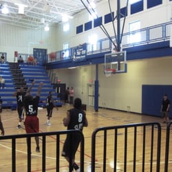 Deveroes Summer Basketball League - Slats, comprised mostly of past and present Bearcats, warms up for its first game of the summer.