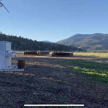Shay Meadows Ranch And Resort - The pews and triangle wedding arches - Venues & Event Spaces Near Me - Big Bear City, California