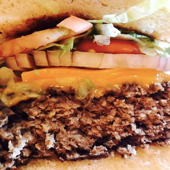 Reverend Jim's Dam Pub - 1lb burger slice - Pubs Near Me - Buchanan Dam, Texas Reverend Jim's Dam Pub - 1lb burger slice - Pubs Near Me - Buchanan Dam, Texas