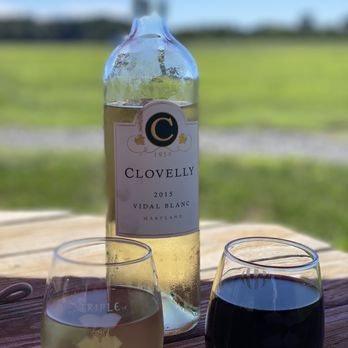 Triple Creek Winery - a glass of wine and a bottle of wine - Wine Tasting Room Near Me - Cordova, Maryland