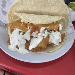 Taco de pescado empanisado