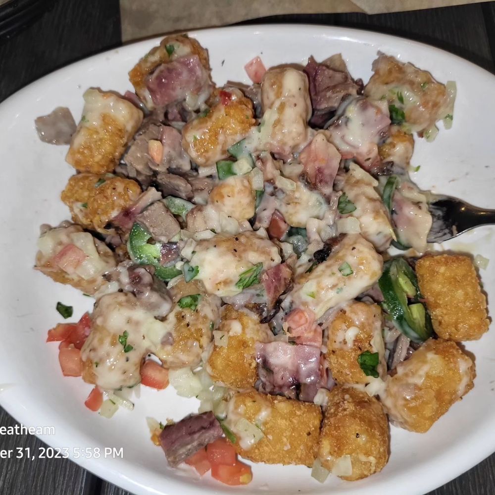 The Brass Tap - Brisket Panchos were good but did need more queso. They were a little dry and not enough brisket. - Gastropubs Near Me - Rockwall, Texas The Brass Tap - Brisket Panchos were good but did need more queso. They were a little dry and not enough brisket. - Gastropubs Near Me - Rockwall, Texas