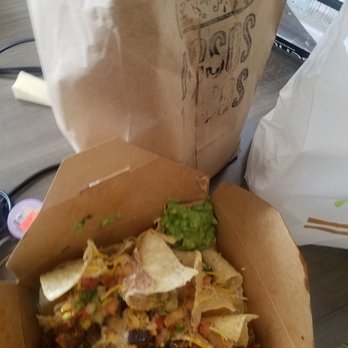 Kesos Tacos - Beef nachos tacos in the bag getting extra sloppy. - Tacos Near Me - Austin, Texas Kesos Tacos - Beef nachos tacos in the bag getting extra sloppy. - Tacos Near Me - Austin, Texas