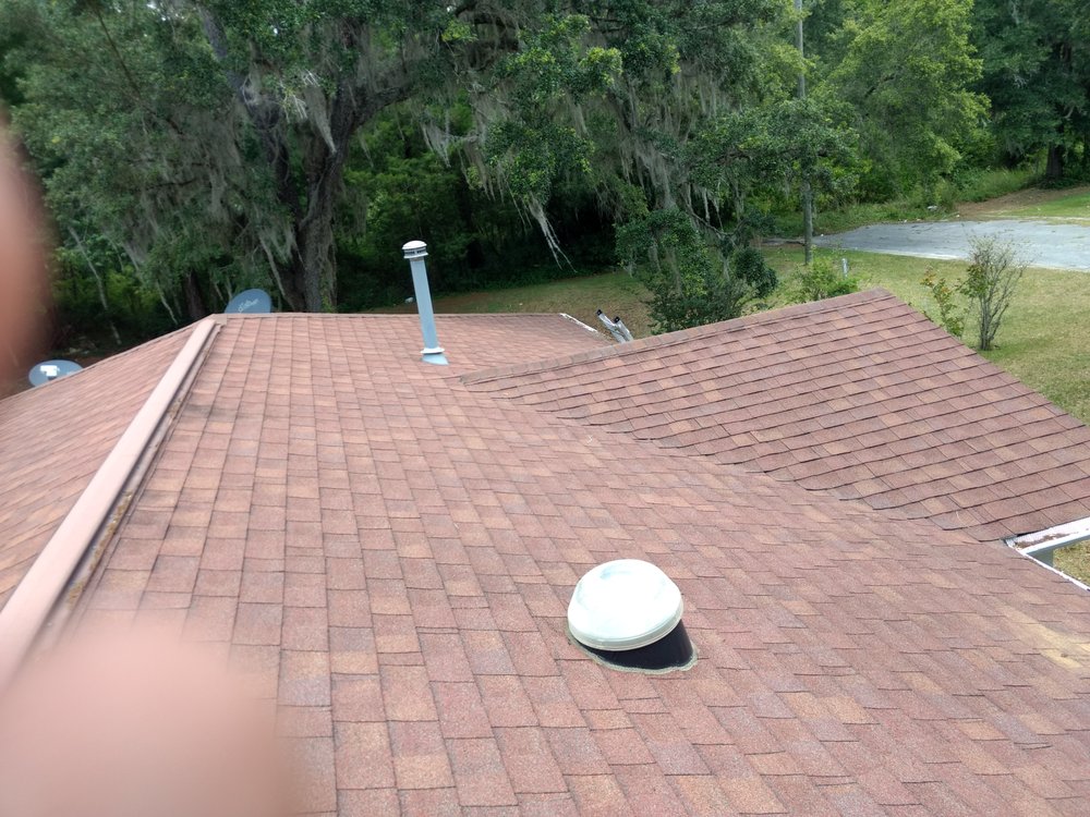 Slide of RC Roofing Florida