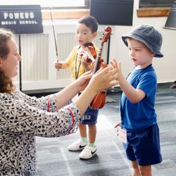 Powers Music School - Children try out new instruments!