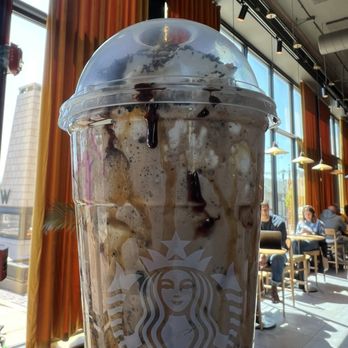 Starbucks - Mocha Cookie Crumble Frappuccino Blended Beverage with caramel drizzle and coconut flakes and salted caramel - Coffee & Tea Near Me - Wheaton, Illinois