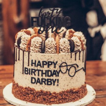 OKC Sweets - a birthday cake on a table - Cupcakes Near Me - Oklahoma City, Oklahoma OKC Sweets - a birthday cake on a table - Cupcakes Near Me - Oklahoma City, Oklahoma