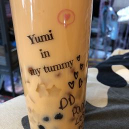 Papaya milk tea with mango jellies, passion fruit popping bubbles, and traditional boba pearls :) Papaya milk tea with mango jellies, passion fruit popping bubbles, and traditional boba pearls :)