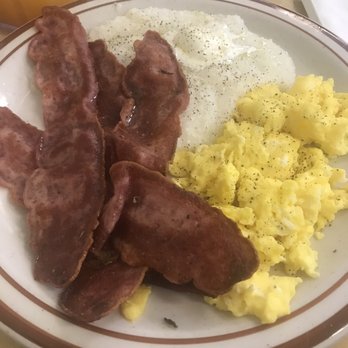 CJ's Cafe - Turkey bacon and eggs- scrambled and oh sooo good. Side of grits included. - Breakfast & Brunch Near Me - Los Angeles, California CJ's Cafe - Turkey bacon and eggs- scrambled and oh sooo good. Side of grits included. - Breakfast & Brunch Near Me - Los Angeles, California
