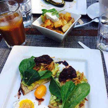 Emma's Torch - Avocado toast, stuffed zucchini and potatoes - Breakfast & Brunch Near Me - Brooklyn, New York Emma's Torch - Avocado toast, stuffed zucchini and potatoes - Breakfast & Brunch Near Me - Brooklyn, New York