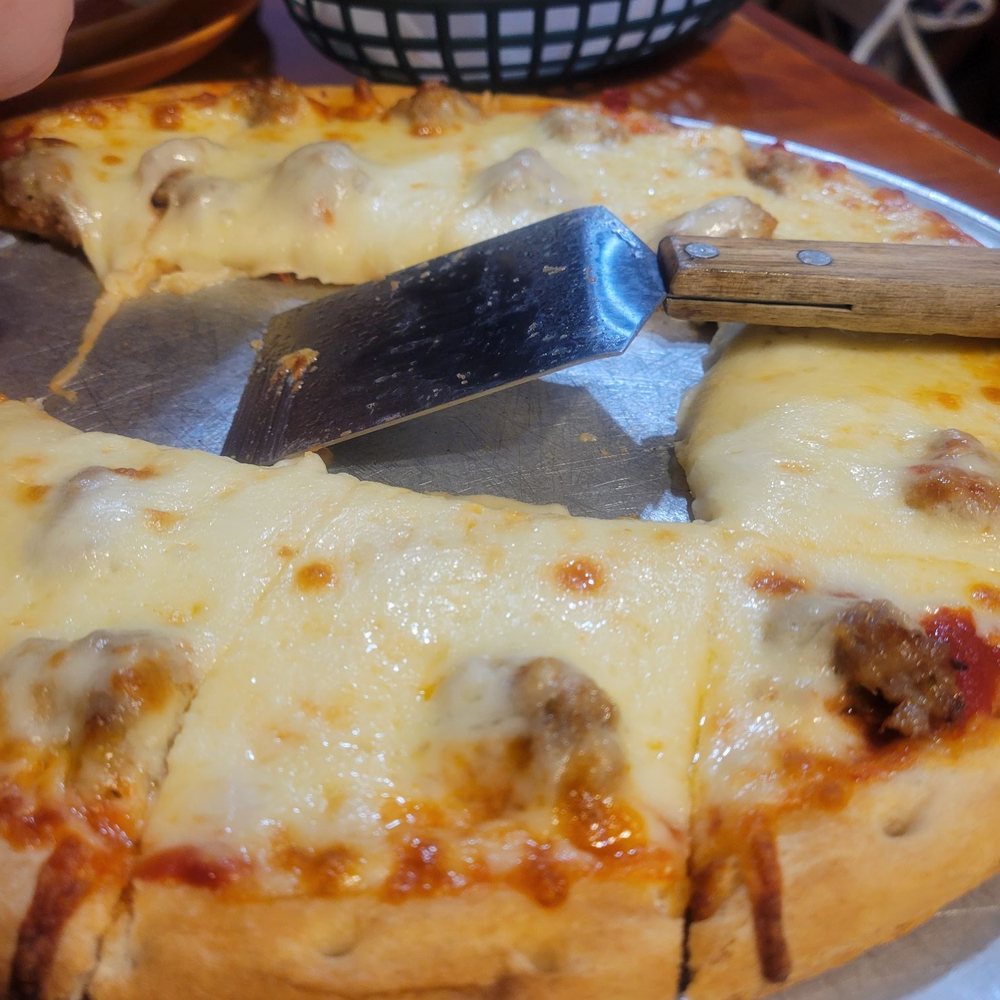 Very cheesy pizza! Very cheesy pizza!
