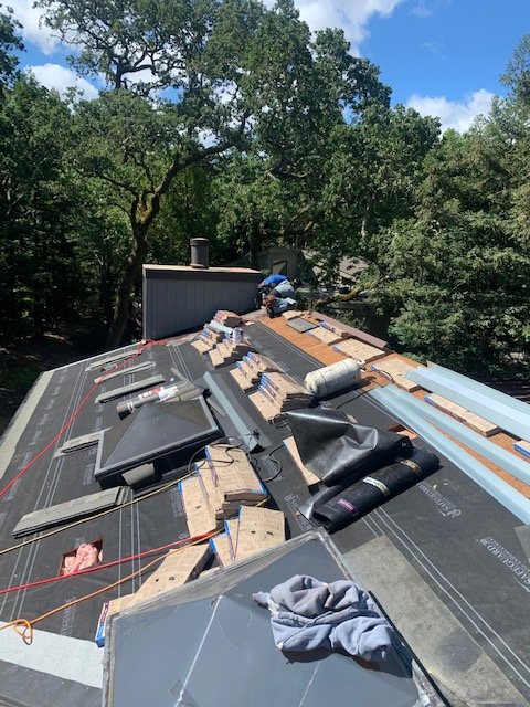 Slide of Westbay Roofing