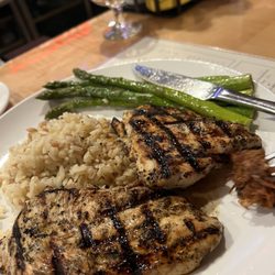 The Refinery - Lemon pepper chicken entree. Grilled asparagus and rice pilaf.