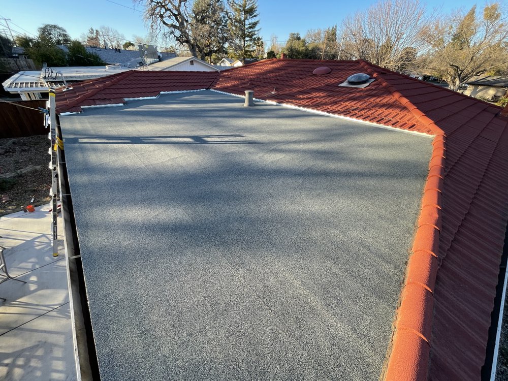 Slide of Triark Roofing