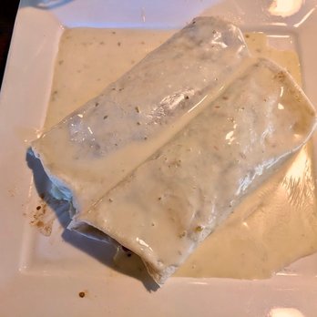 El Rancho Grande - Order the Lorenzo! A single veggie burrito #4, but now doubled with the beans and rice inside slathered in delicious a cheese sauce. Yummy! - Mexican Near Me - Dayton, Ohio