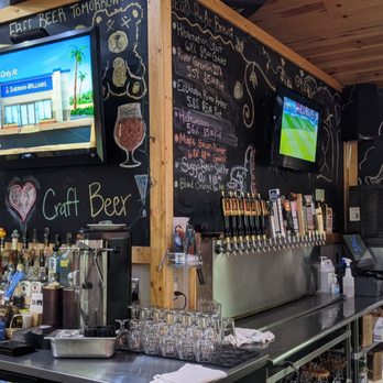 Dead Bear Brewing - a bar with a chalkboard wall - Breweries Near Me - Grayling, Michigan