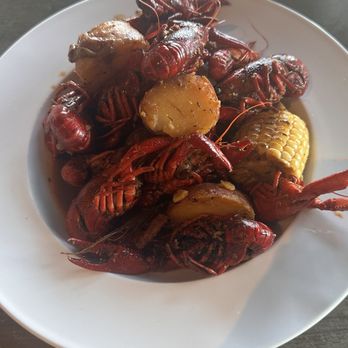 Crawdads on the Lake - A bucket of crawdads with crawfish, 2 small corn on the cob and some red potatoes. - Cajun/Creole Near Me - Folsom, California Crawdads on the Lake - A bucket of crawdads with crawfish, 2 small corn on the cob and some red potatoes. - Cajun/Creole Near Me - Folsom, California