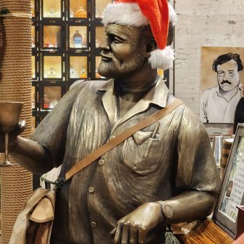 Hemingway Distillery - Hemingway in his Santa hat - Distilleries Near Me - Key West, Florida Hemingway Distillery - Hemingway in his Santa hat - Distilleries Near Me - Key West, Florida
