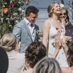 Samson Photography - Groom and bride proceed down the aisle together.