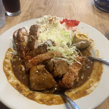 Curry Hyuga - The signature curry adding pork and egg (AMAZING) - Japanese Curry Near Me - Cupertino, California Curry Hyuga - The signature curry adding pork and egg (AMAZING) - Japanese Curry Near Me - Cupertino, California