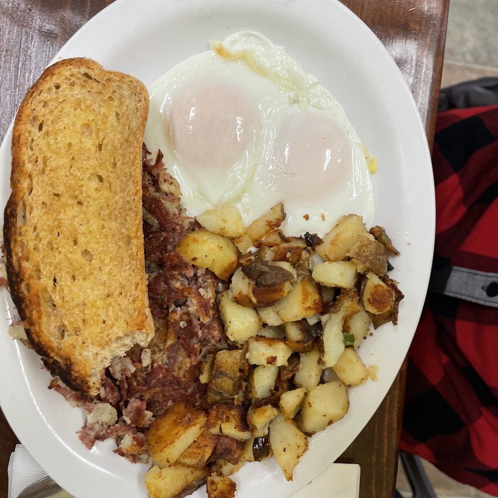 Mike’s Breakfast and Lunch - Homemade corned beef hash, wheat toast and eggs (mom got a bite in before I could snap the photo) - Cafes Near Me - Lakeport, California Mike’s Breakfast and Lunch - Homemade corned beef hash, wheat toast and eggs (mom got a bite in before I could snap the photo) - Cafes Near Me - Lakeport, California