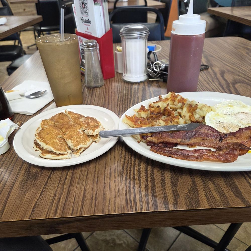 Pancakes bacon eggs and hash browns. Pancakes bacon eggs and hash browns.