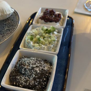 Meraki - Dip trio - black garlic hummus, whipped goat cheese, and tzatziki - Mediterranean Near Me - Fort Worth, Texas