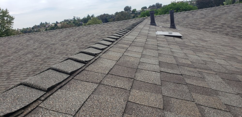 Slide of Hart Roofing