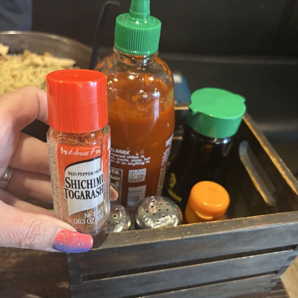 The fixin's. Chili oil, soy sauce, togarashi, etc. Right on the table. The fixin's. Chili oil, soy sauce, togarashi, etc. Right on the table.