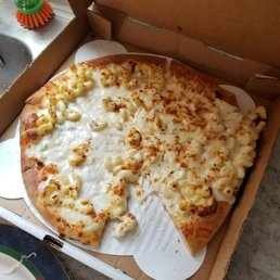 Mac and Cheese pizza with some toppings misplaced Mac and Cheese pizza with some toppings misplaced