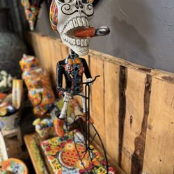 Pottery House - Who smokes and bikes these days? This guy!