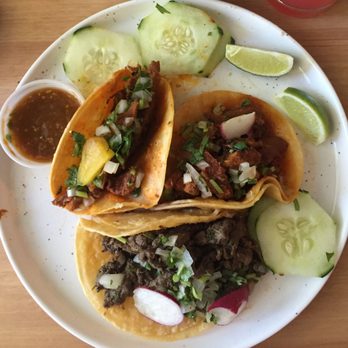 Tacos Don Perez - plated at home - one carne asada and two tacos al pastor with the paired sauce and included garnishes - Food Trucks Near Me - Silver Spring, Maryland Tacos Don Perez - plated at home - one carne asada and two tacos al pastor with the paired sauce and included garnishes - Food Trucks Near Me - Silver Spring, Maryland